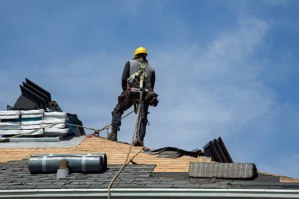 Professional Roofing technician working in Wayland, IA